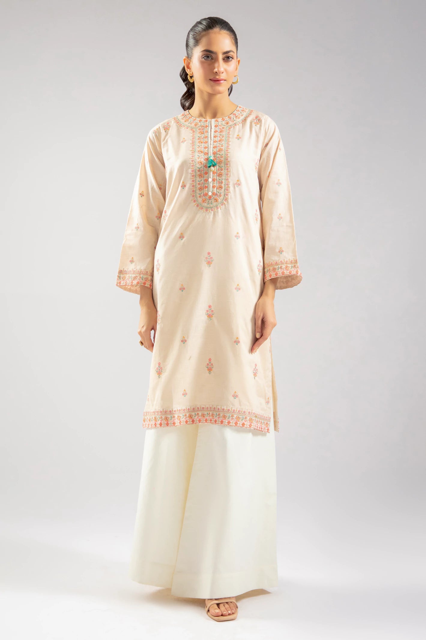 Timeless Elegance Redefined Cream Embroidered Kurti