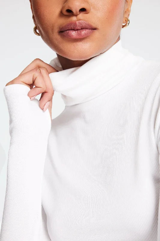 Stretch In Style With Budget-Friendly Yoga Wear Jackson Rib Cropped Turtleneck - White Stretch In Style With Budget-Friendly Yoga Wear Jackson Rib Cropped Turtleneck - White
